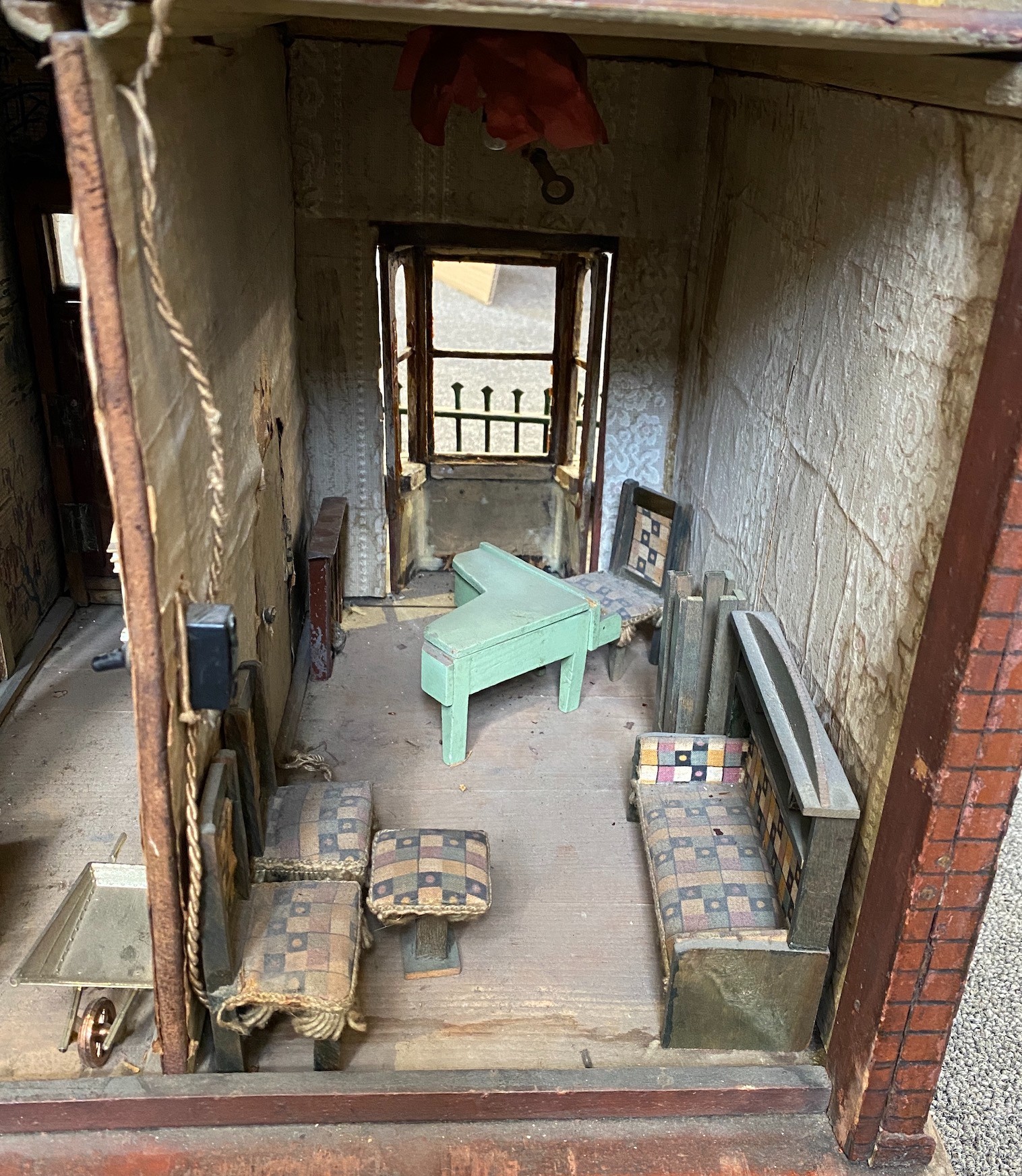 A back-opening furnished English dolls’ house, late 19th century, 74cm high